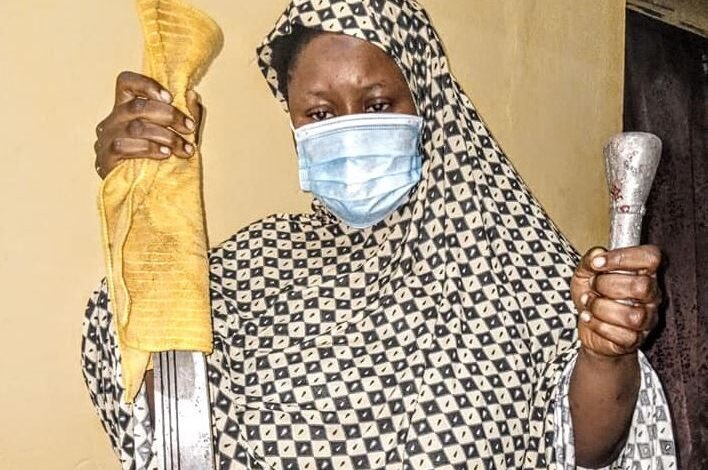 Police parade 26-year-old mother who hacked her two children to death because her husband married a 2nd wife 13 Police parade 26-year-old mother who hacked her two children to death because her husband married a 2nd wife 1