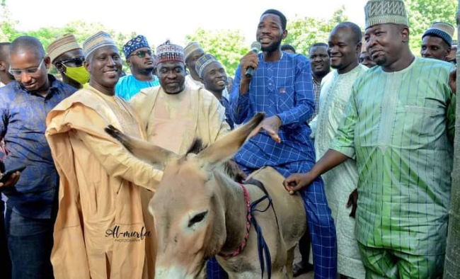 Ganduje's aide shares donkey and other items to empower Kano youths 3