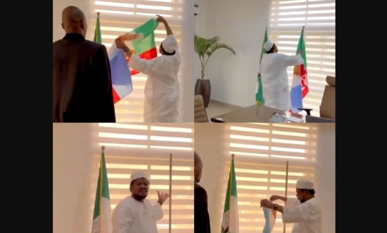 (VIDEO) Politician, Adamu Garba, yanks off APC flag from his office days after failing to secure his presidential nomination form 1